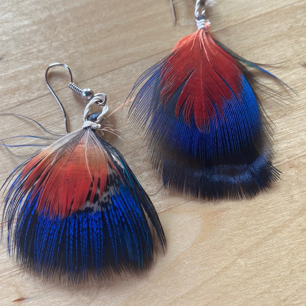 Feather earrings handmade by indigenous women Amazon Rainforest, Ecuador